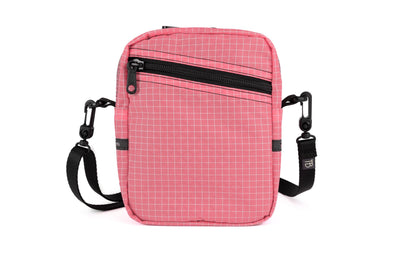 visible variant TB0416-4DGE^^An Everyday Cubelet in Cubelet Halcyon (pale pink with a white grid) with a front zipper.