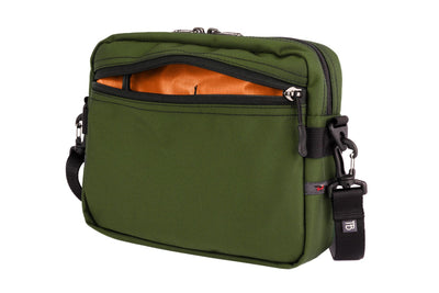 visible variant TB0414-VKPL^^The Side Kick in Saguaro (olive green) 630 Ballistic with a Persimmon (dark orange with orange grid) 210 Cerylon interior.