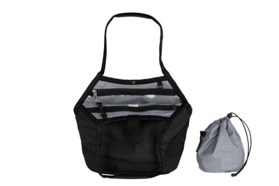 visible variant TB0660-BKND^^A Swift in Black Ballistic with Northwest Sky (bright green with white grid) 200 Halcyon interior and Yarn Stuff Sack.