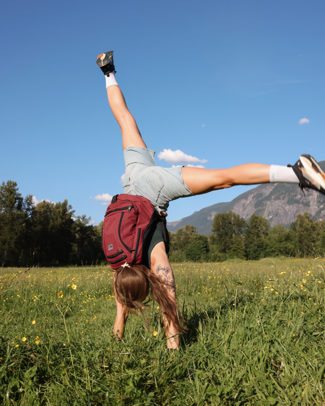 visible lifestyle^^A person wearing a Bordeaux Spectron Synapse 19 while doing a cartwheel.