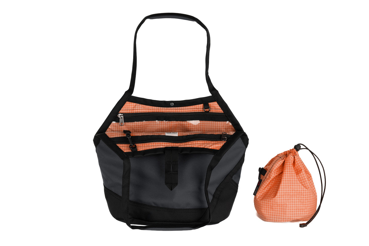 visible variant TB0660-GK3D^^A Swift in Nebulous Ballistic with Cantaloupe (pale orange with white grid) 200 Halcyon interior and Yarn Stuff Sack.