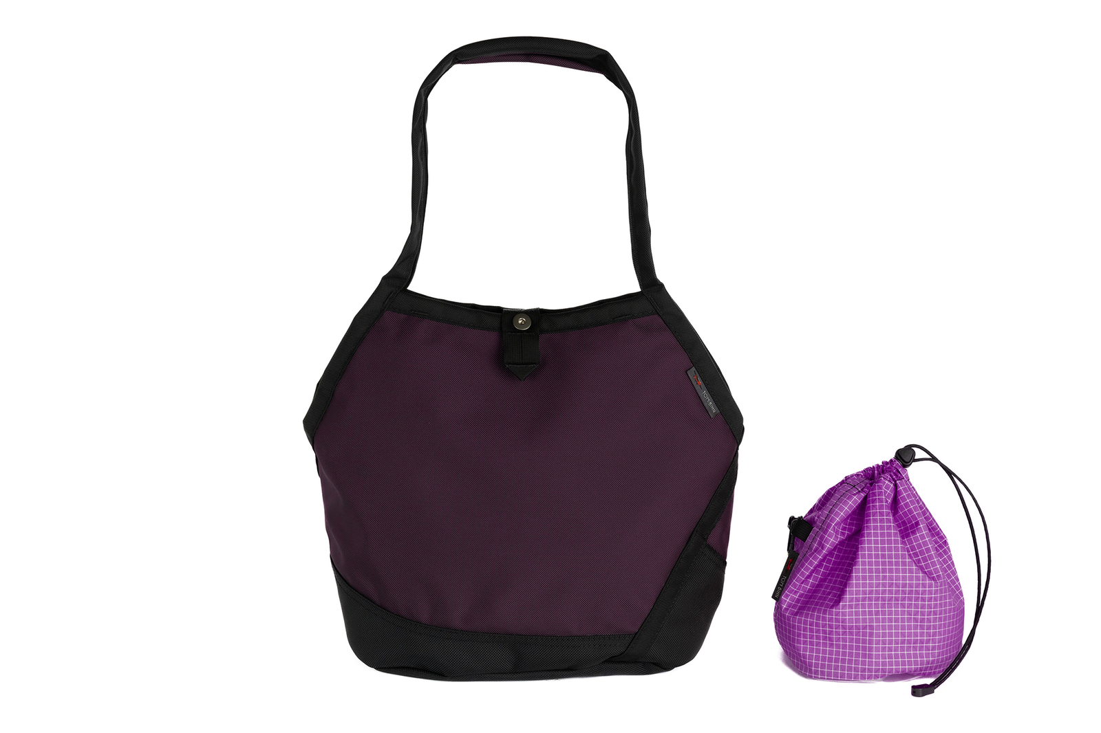 visible variant TB0660-UKUD^^A Swift in Aubergine Ballistic with Ultaviolet (purple with white grid) 200 Halcyon interior and Yarn Stuff Sack.