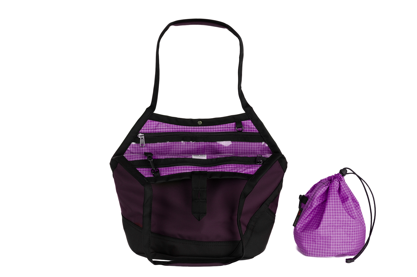 visible variant TB0660-UKUD^^A Swift in Aubergine Ballistic with Ultraviolet (purple with white grid) 200 Halcyon interior and Yarn Stuff Sack.