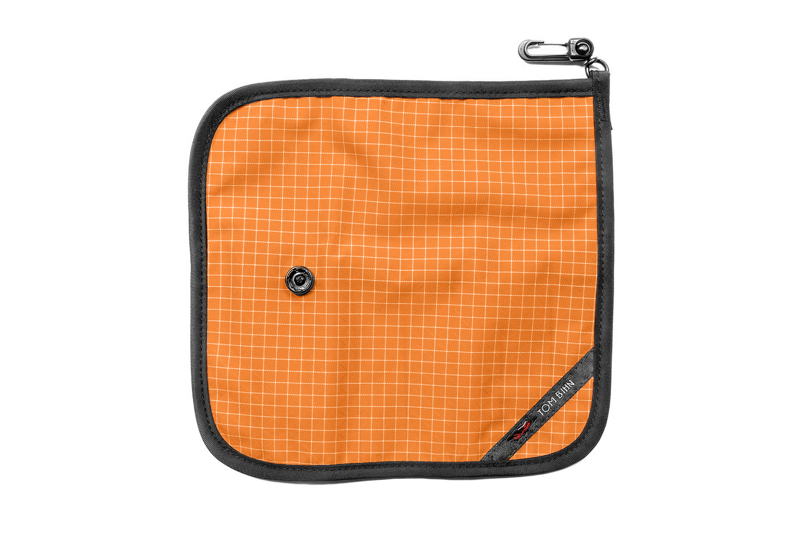 visible variant TB1235-ZD^^The front of a Tool Pen Wrap in Zest (orange with white grid) 200 Halcyon.