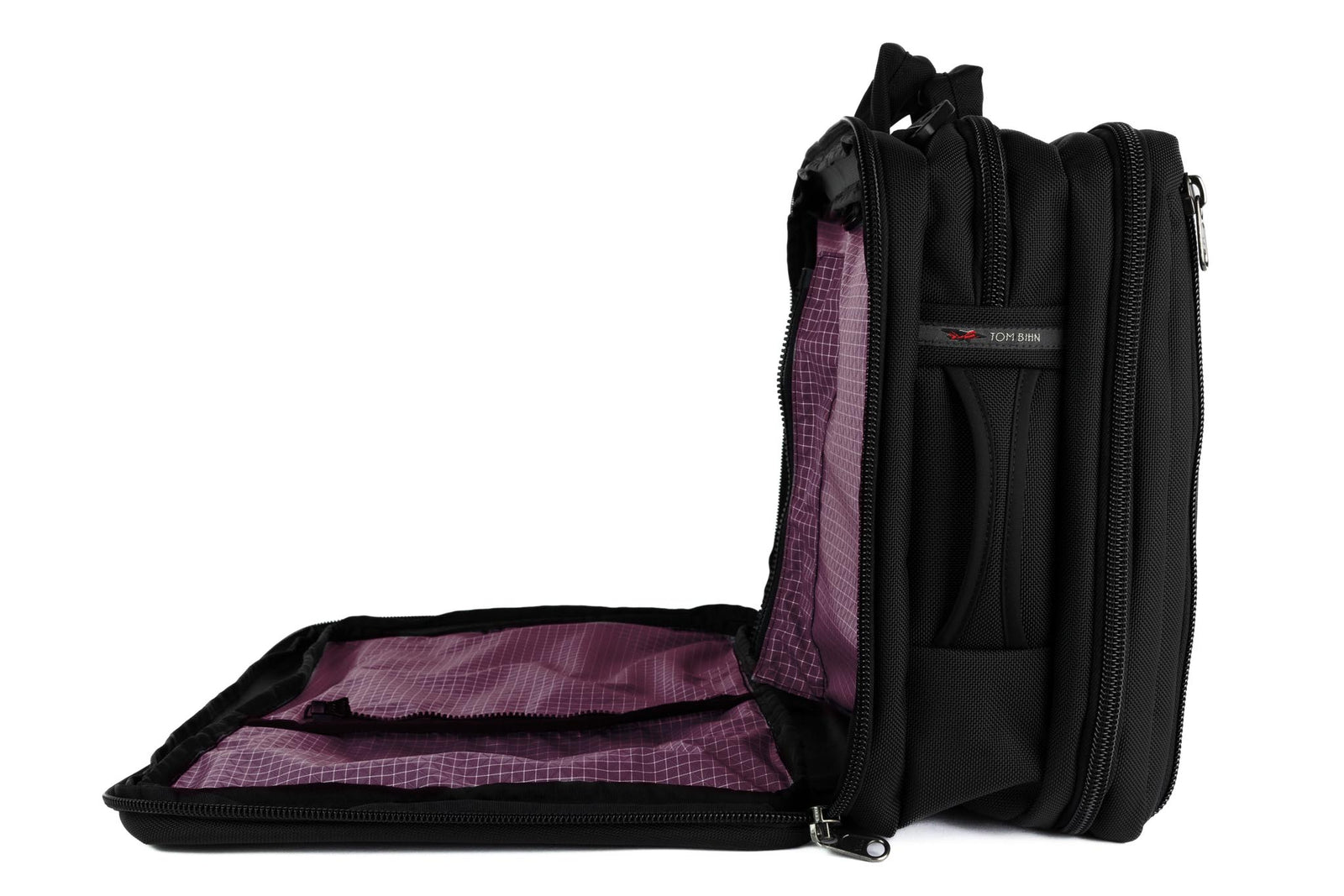 visible variant TB0940-BB5D^^A Tri-Star in Black 525 Ballistic with an Acai (dark purple with white grid) 200 Halcyon interior.