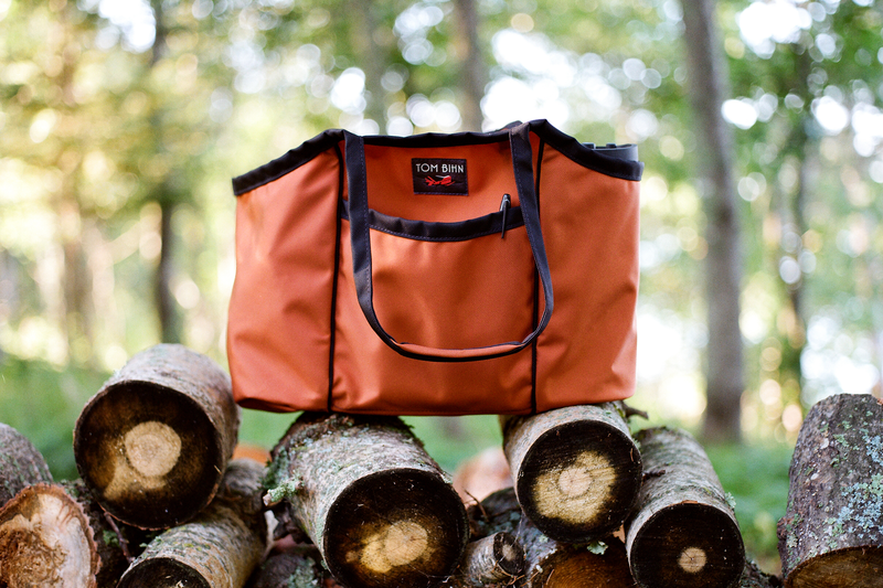 visible lifestyle^^A Truck sitting on some logs.
