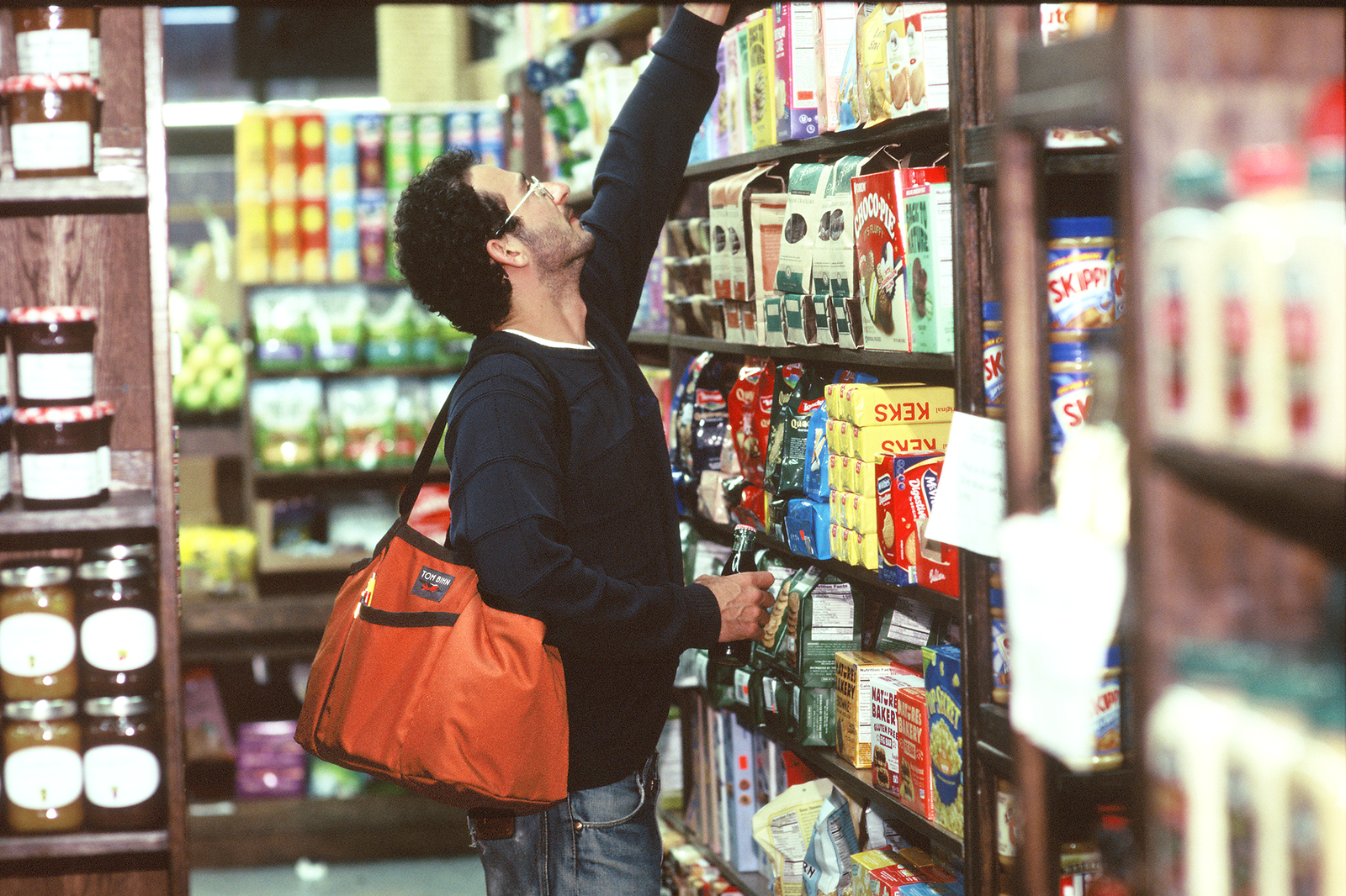 visible lifestyle^^A person wearing a Truck while shopping at an outfitters.