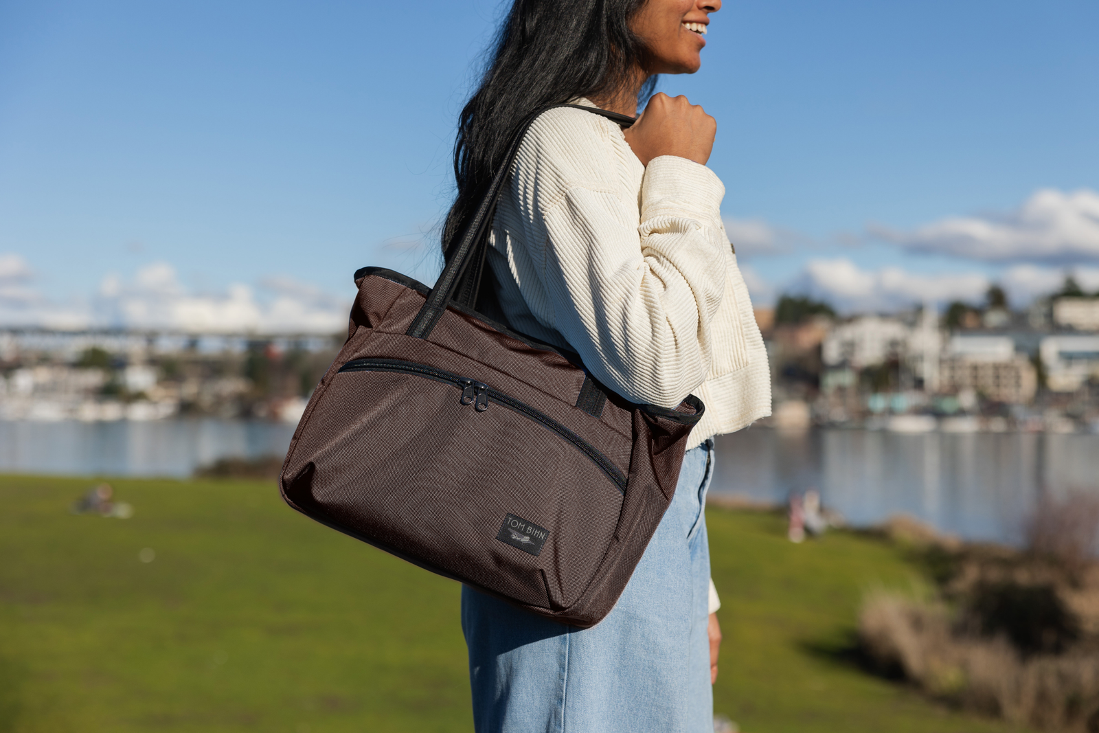 visible lifestyle^^A person carrying a Nomad Tote on their shoulder.