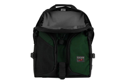 visible variant TB0114-WKGL^^The Brain Bag in Wilderness (forest green) Ballistic with the front main compartment zipper opened to reveal its Cloud (grey with light grey interior) 210 Cerylon interior.