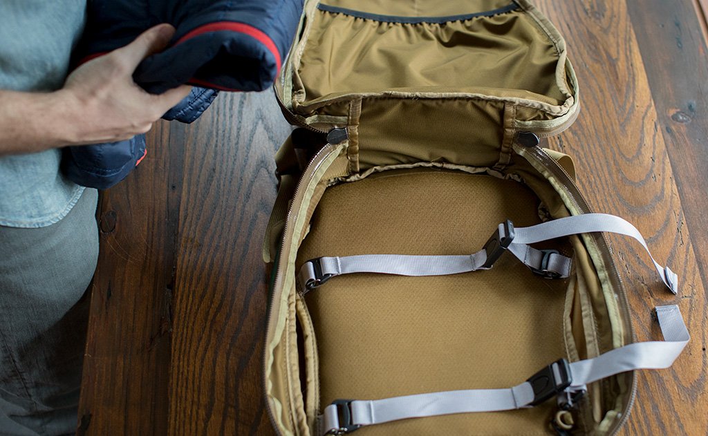 detail visible^^The Guide's Edition Synik 22's clamshell opening open to reveal the main compartment.