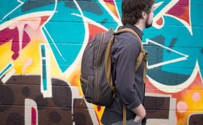 lifestyle visible^^A profile shot of a person wearing the Guide's Edition Synik 30 with the sternum strap unbuckled.