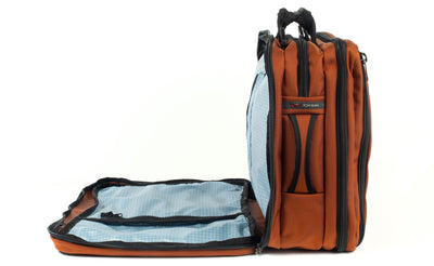visible variant TB0940-TB7D^^A Tri-Star in Burnt Orange 1050 Ballistic with an Tidal (pale blue with white grid) 200 Halcyon interior.