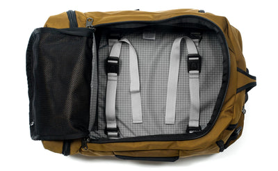 visible variant TB0902-CKND^^ A Techonaut 30 with a Coyote (sand brown) exterior with Northwest Sky (light grey with white grid pattern) 200 Halcyon interior.