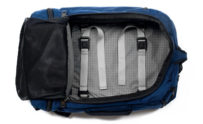 visible variant TB0902-DKND^^ A Techonaut 30 with a Deep Blue (dark blue) exterior with Northwest Sky (light grey with white grid pattern) 200 Halcyon interior.