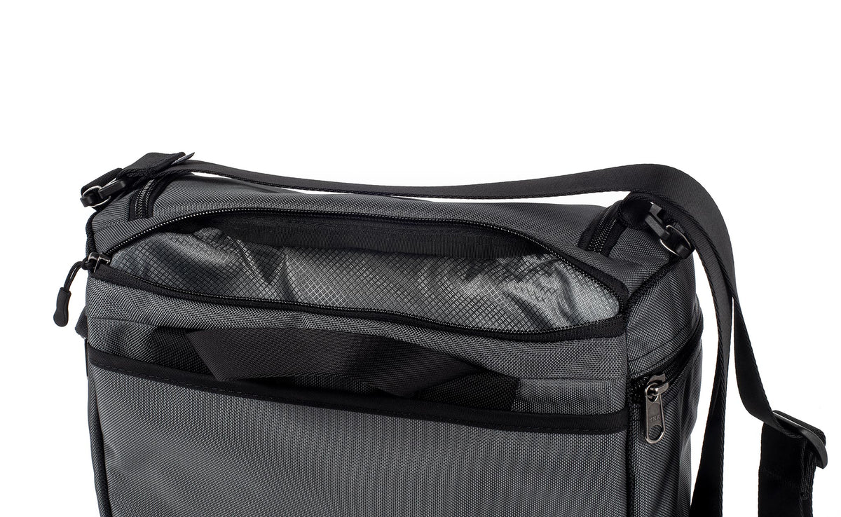 detail visible^^Laptop compartment open at back of Cambiata between the backpack straps and main compartment.