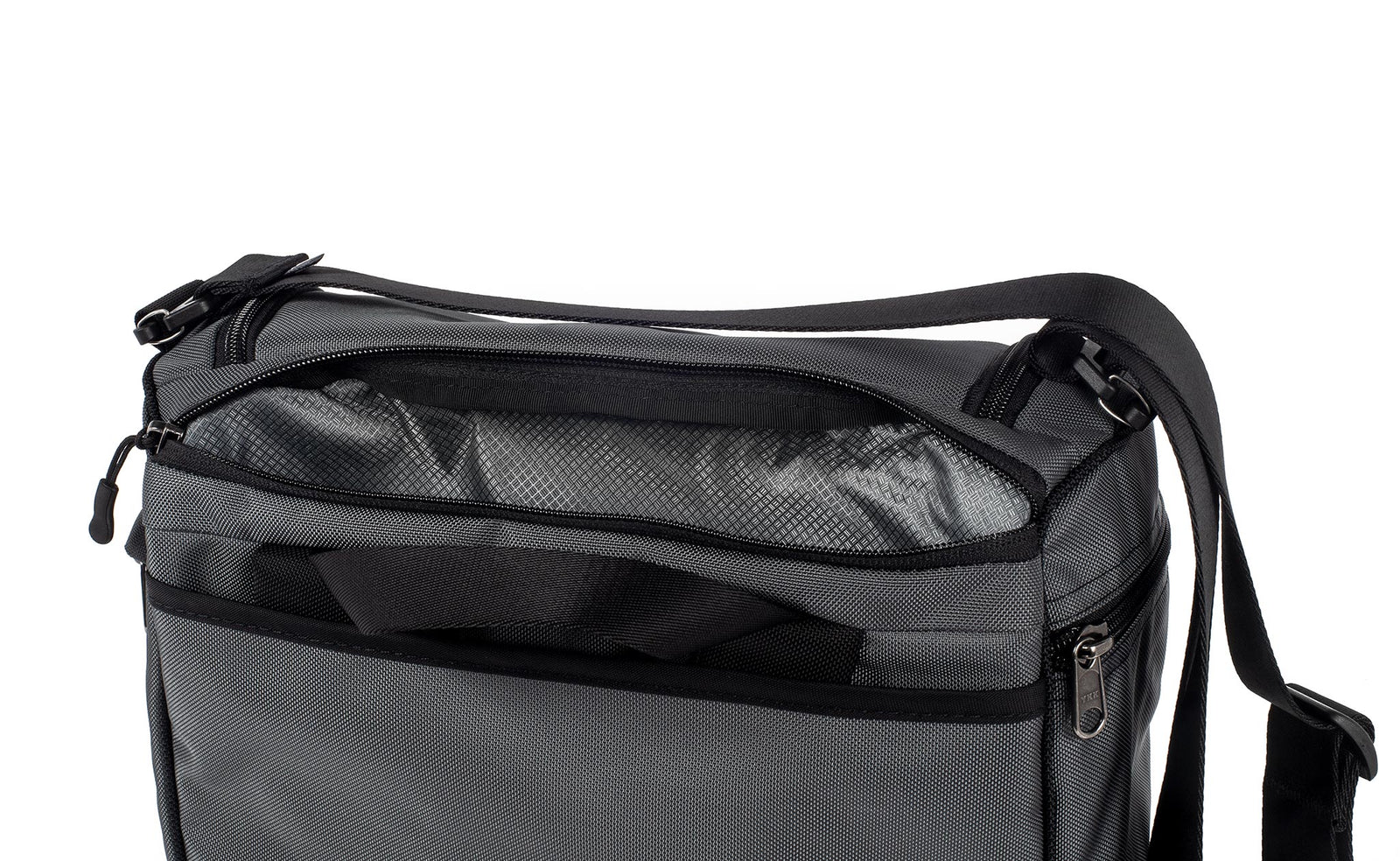 detail visible^^Laptop compartment open at back of Cambiata between the backpack straps and main compartment.