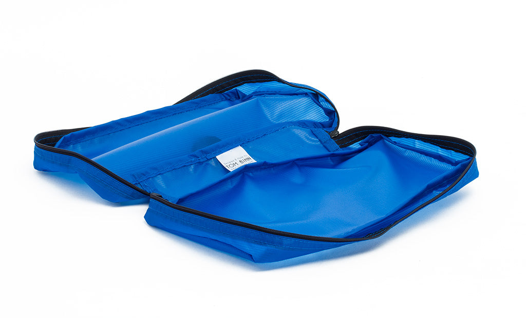 visible variant TB90502-LE^^An empty and open Island (blue) Aether End Pocket Aeronaut 30 Packing Cube.