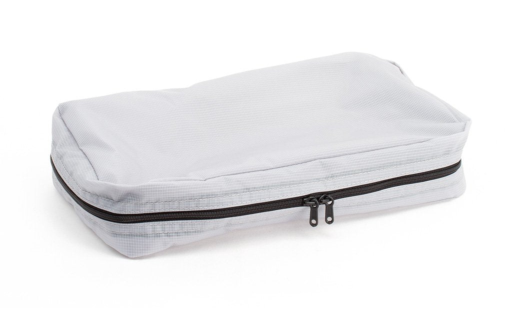 visible variant TB90502-NE^^An empty and zipped closed Northwest Sky (light grey) Aether End Pocket Aeronaut 30 Packing Cube.