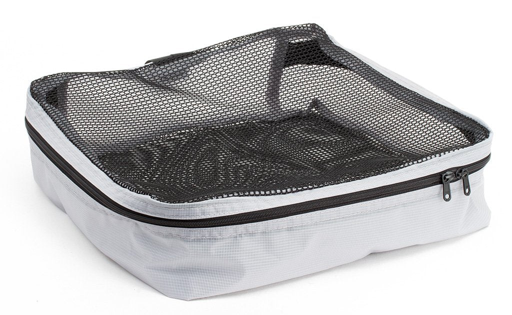 visible variant TB90504-NE^^An empty and zipped closed Northwest Sky (light grey) Aether Large Aeronaut 30 Packing Cube.
