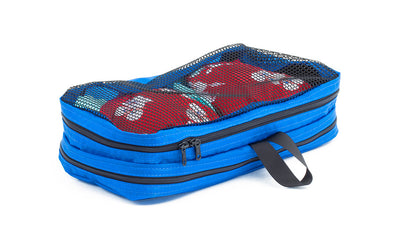visible variant TB90501-LE^^A filled and zipped closed Island (blue) Aether Small Laundry Aeronaut 30 Packing Cube showing the mesh side.