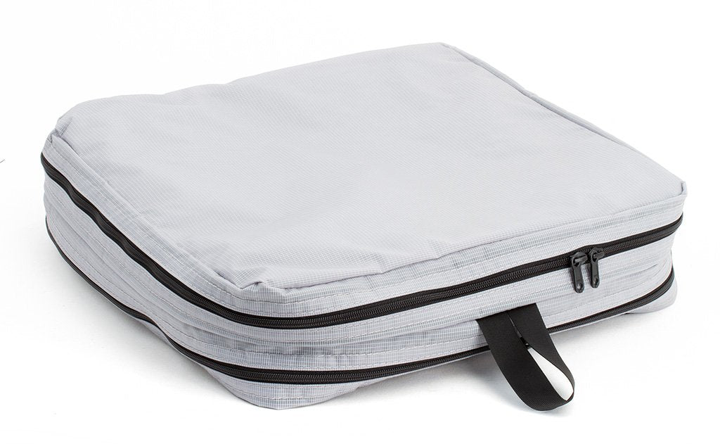 visible variant TB90505-NE^^A filled and zipped closed Northwest Sky (light grey) Aether Large Aeronaut 30 Packing Cube all-fabric side up.
