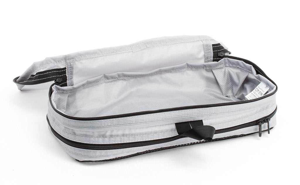 visible variant TB90501-NE^^An empty and open Northwest Sky (light grey) Aether Small Aeronaut 30 Packing Cube open all-fabric side up.