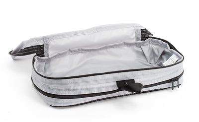 visible variant TB90501-NE^^An empty and open Northwest Sky (light grey) Aether Small Aeronaut 30 Packing Cube open all-fabric side up.