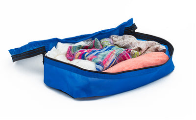 visible variant TB90500-LE^^A set of clothes in an open Island (blue) Aether Aeronaut 30 Small Packing Cube holding multiple changes of undergarmants.