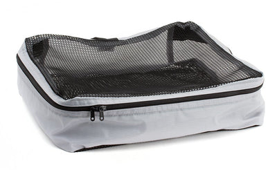 visible variant TB90604-NE^^An empty and open Northwest Sky (light grey) Aether Large Aeronaut 45 Packing Cube.