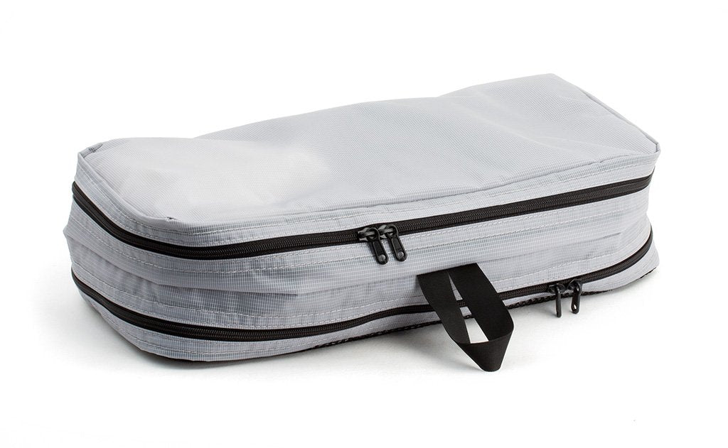 visible variant TB90601-NE^^A filled and zipped closed Northwest Sky (light grey) Aether Small Aeronaut 45 Packing Cube all-fabric side up.