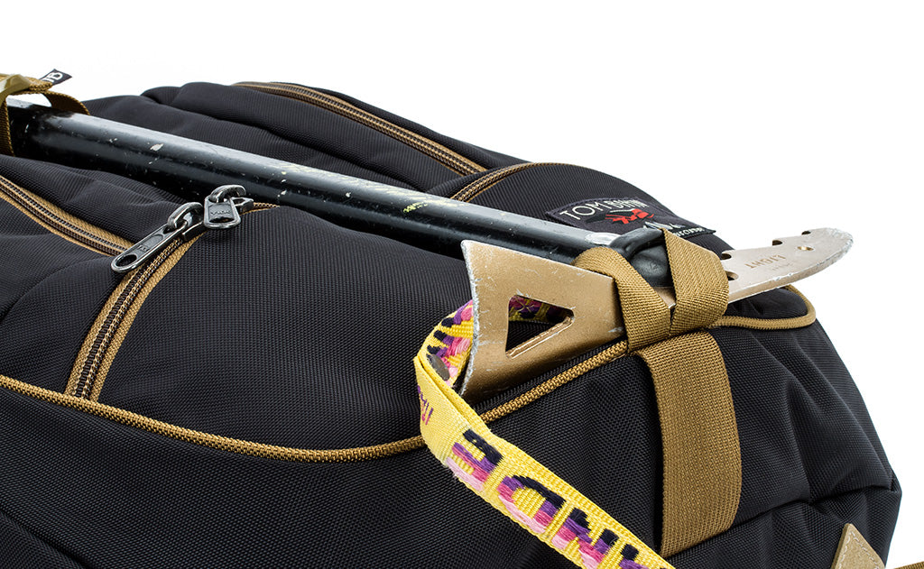 detail visible^^A close shot of an ice axe lashed to the face of a Guide's Edition Synapse 25 using the front lashpoint and ice axe loop.