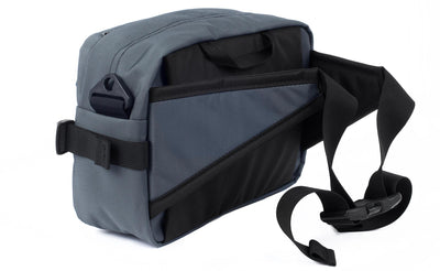 detail visible^^A 3/4 shot of the Le Grand Derriere showing the side and rear of the pack with its hip belts out and connected.