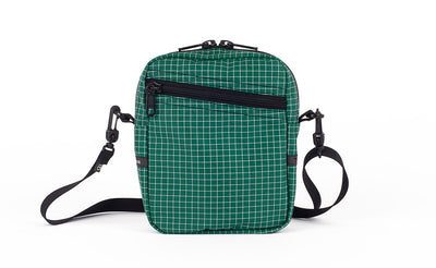 visible variant TB0416-KDGE TB0416-KDNE TB0416-KDLE^^An Everyday Cubelet in Sitka Halcyon (green with a white grid) with a front zipper.