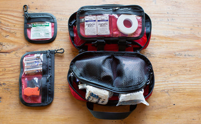 lifestyle ^^Interior shot of a filled First Aid Pouch in Red