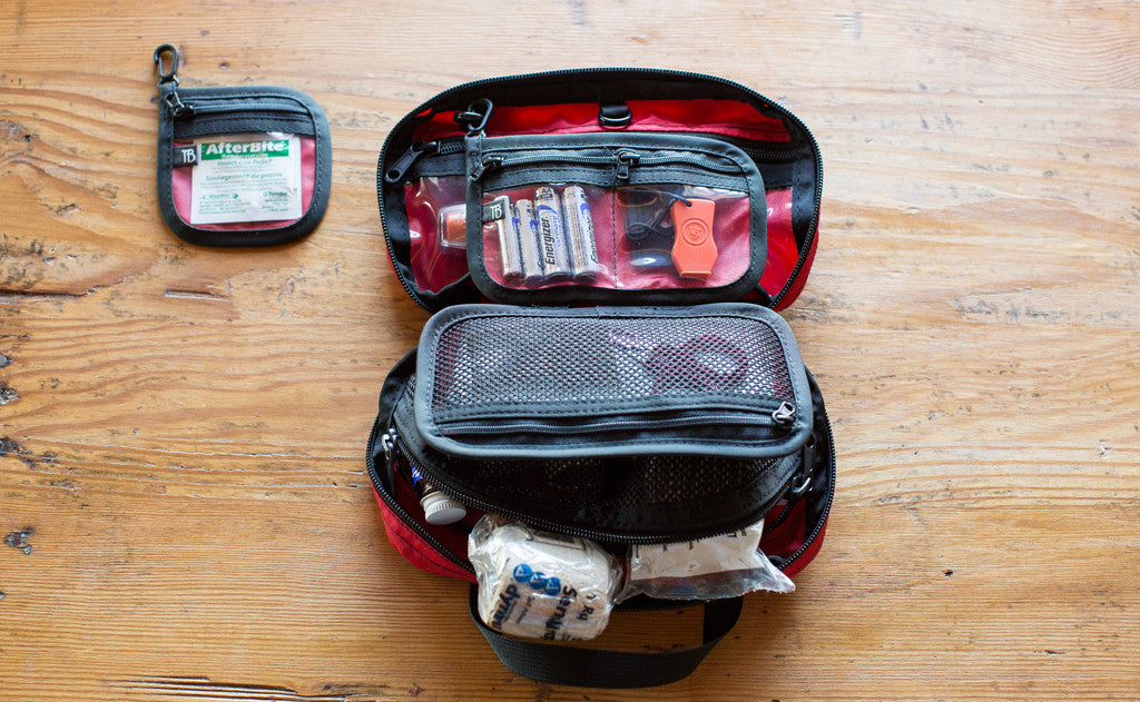 lifestyle ^^Interior shot of a filled First Aid Pouch in Red