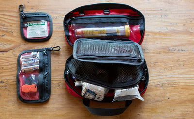 lifestyle ^^Interior shot of a filled First Aid Pouch in Red