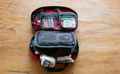 lifestyle ^^Interior shot of a filled First Aid Pouch in Red