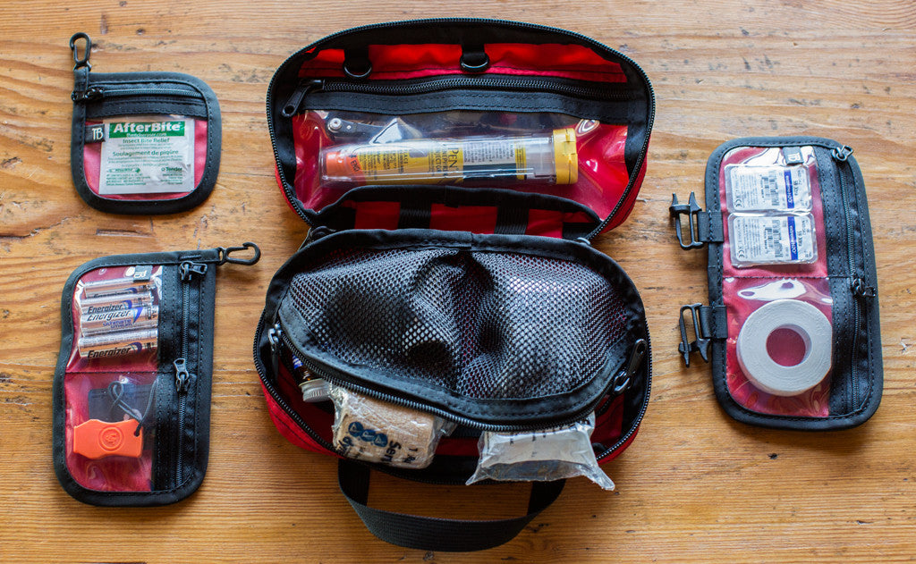 lifestyle ^^Interior shot of a filled First Aid Pouch in Red