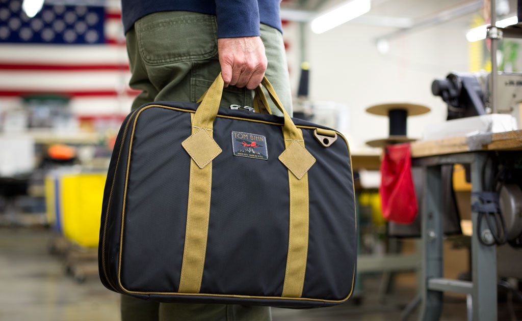 lifestyle visible^^A person carrying the Founder's Briefcase.