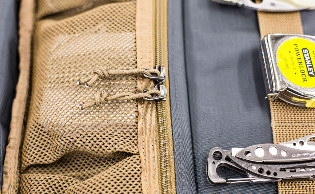 A close shot of the zippered pockets on the interior of the Founder's Briefcase.