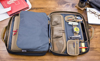 An open Founder's Briefcase with a possible loadout including the Founder's Briefcase Wedge.