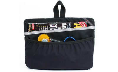 visible variant TB1836-BJ^^ The Black Maker's Bag / Swift Freudian Slip, holding a magazine and knitting tools.
