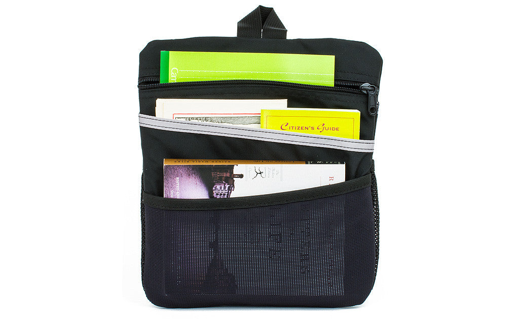 visible variant TB1834-BJ^^ The back of the Black Medium Cafe Bag Freudian Slip, packed with notebooks and a paperback book.