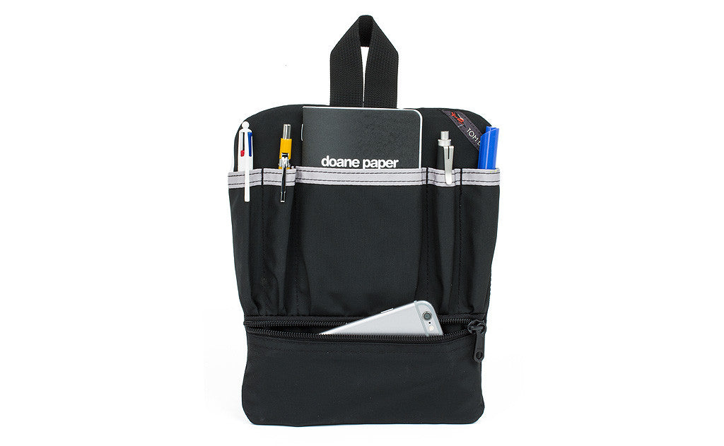 visible variant TB1833-BJ^^ A  Black Small Cafe Bag Freudian Slip carrying four pens, a Fields Notebook and a Phone