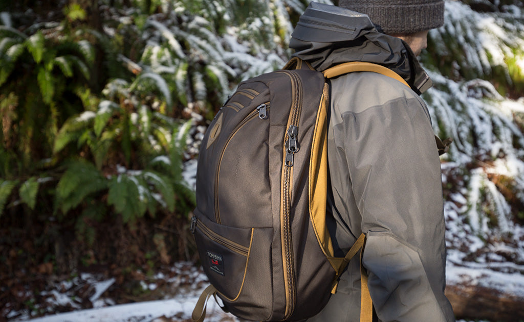 lifestyle  visible^^A profile shot of a person wearing with the Guide's Edition Synik 30.