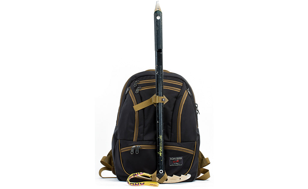 detail visible^^An ice axe lashed to the face of a Guide's Edition Synapse 25 using the front lashpoint and ice axe loop.