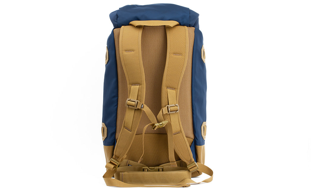 detail visible^^A reverse shot of the Guide's Pack in Navy (dark blue) 420 Parapack.