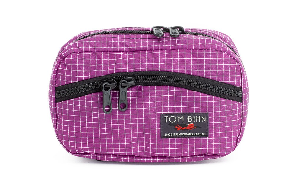 visible variant TB0418-UD^^The front of a Handy Little Thing #1 in Ultraviolet (purple with white grid) 200 Halcyon showing the front zipper with two slider and logo at the bottom-right corner.