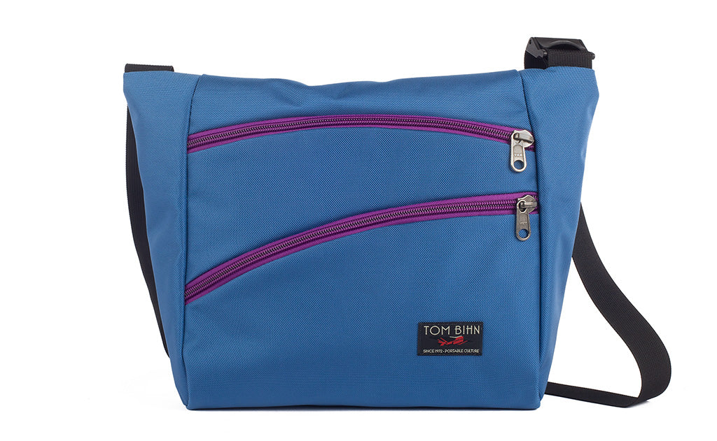 visible variant TB1415-NKUZ^^Icon in Constellation (light blue) 525 Ballistic with Ultraviolet (purple) zippers.