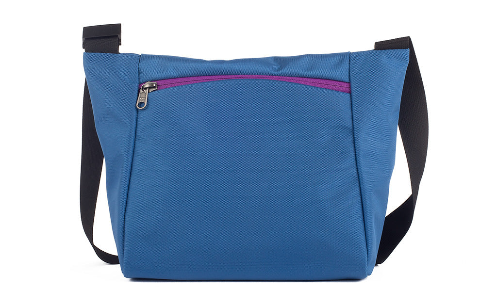 visible variant TB1415-NKUZ^^Reverse shot of an Icon in Constellation (light blue) 525 Ballistic with Ultraviolet (purple) zippers.